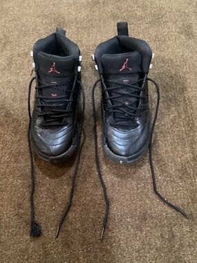 Jordan Black Sneakers with Red Jumpman Accents